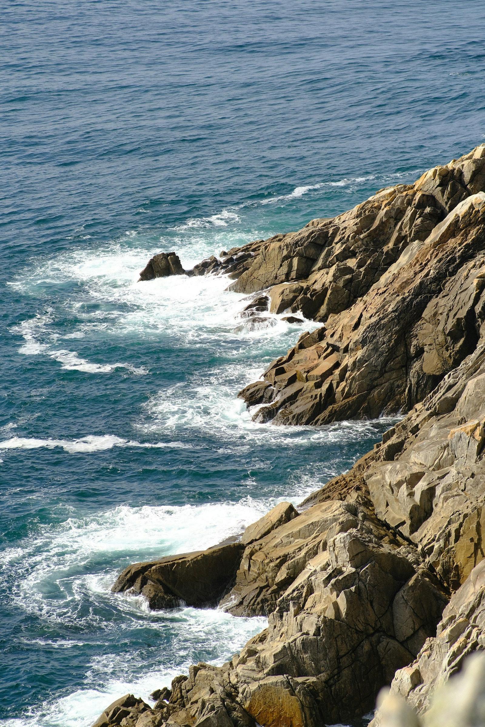 Waves breaking along a rocky coast